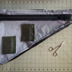 Step-by-step guide showing how to make a DIY frame bag for bikepacking on a budget