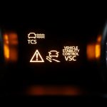 Dashboard warning light showing traction control and vehicle stability control system indicators illuminated