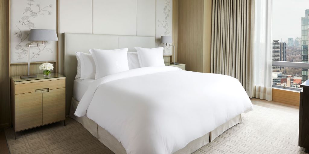 Soft queen bedding with an all-season comforter and matching pillow shams.